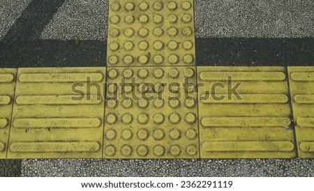 Tactile Paving on Modern Tiles Pathway for Blind Handicap, Signs for the blind path