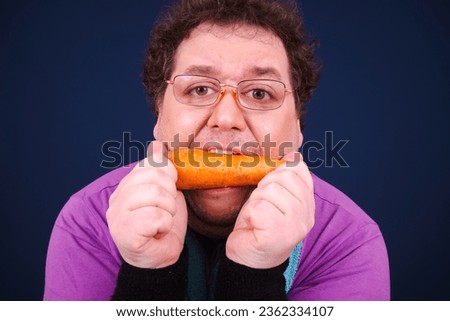 Funny fat man on a diet. Blue background.