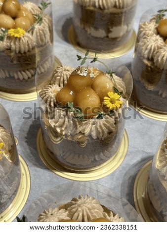 Delicious Caramel Macadamia Coffee Birthday Short Cake Isolated On White With No People. Cake on wooden plate. Bakery picture free space for text. Menu cafe and coffee shop.