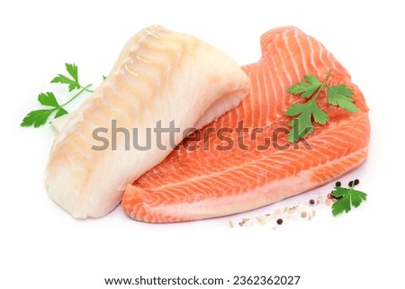 Fish with herbs on white background, closeup.