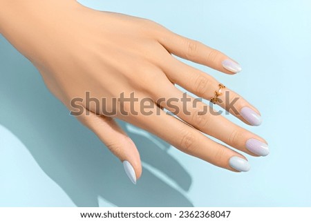 this is a beautiful hand picture with gold ring in the isolated background.