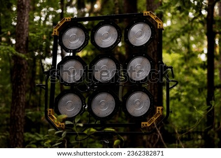 lighting devices when shooting a movie in the country in the forest