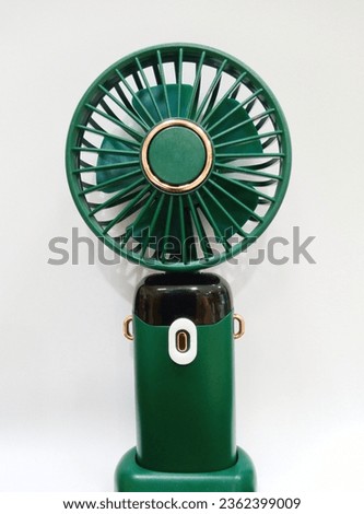 cute mini portable fan very helpfull with hot climate