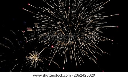 illuminated sky by shooting firecrackers Royalty-Free Stock Photo #2362425029