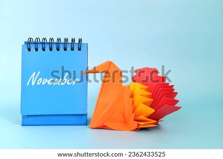 Selective focus of November calendar with turkey decoration. Thanksgiving day and Hello November concept. Royalty-Free Stock Photo #2362433525