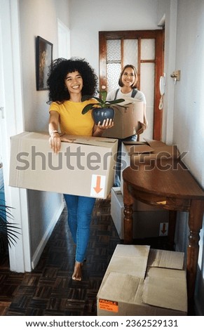 Excited, homeowner or couple with boxes, lesbian or moving with real estate, achievement or happiness. Queer people, happy women or girl with marriage, mortgage or new apartment with property or love Royalty-Free Stock Photo #2362529131