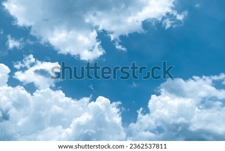 Sky and fluffy cloud scenery in the morning is incredibly calming to start the day,sky and fluffy white cloud made me feel relaxed,sky and fluffy cloud scenery take a majestic and breathtaking beauty Royalty-Free Stock Photo #2362537811