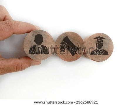 Wooden blocks with qualifications, certificates and graduate icons. The concept of academic qualifications. The concept of required skills.  Royalty-Free Stock Photo #2362580921