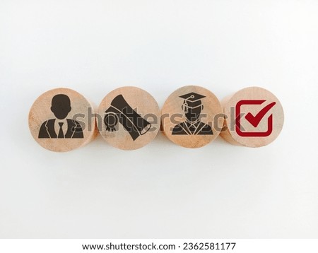 Wooden blocks with qualifications, certificates and graduate icons. The concept of academic qualifications. The concept of required skills.  Royalty-Free Stock Photo #2362581177