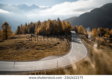Scenic twisty road and panoramic view from the top Bernina Pass in autumn, Swizterland