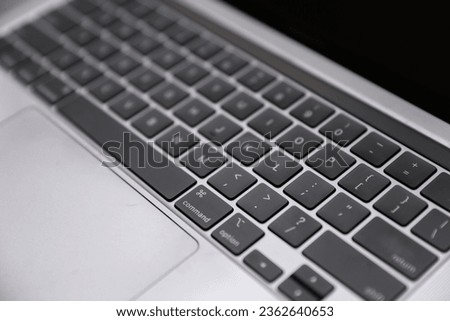modern computer keyboard bathed in soft, diffused light, resting on a sleek desk. A symbol of productivity and connectivity, it invites creativity in the digital age