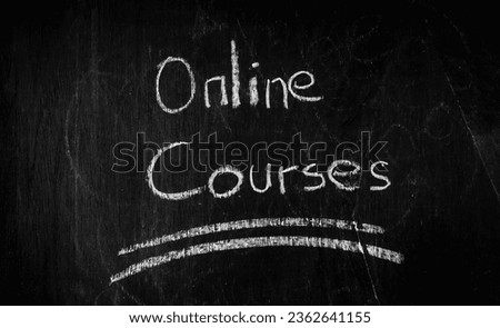 Online courses text on a blackboard 