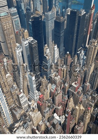 Amazing architectural perspective in Manhattan as seen from Viewing gallery of Empire State Building, NYC, USA.