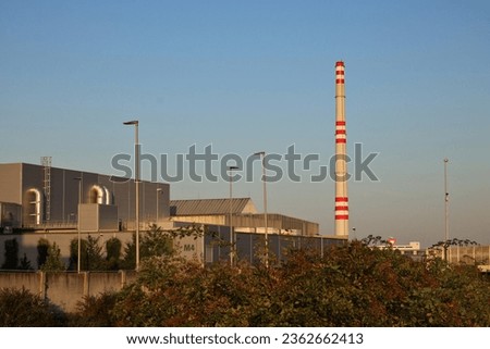 Factory panorama with high factory chimney