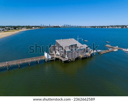 Wollaston Beach aerial view and Squantum Yacht Club with Boston city skyline in Wollaston, city of Quincy, Massachusetts MA, USA. 