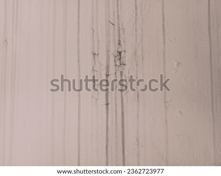 natural background of cracked walls and traces of melt water from above
