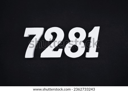 Black for the background. The number 7281 is made of white painted wood.