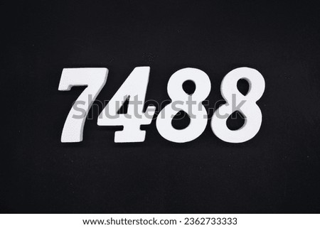 Black for the background. The number 7488 is made of white painted wood.