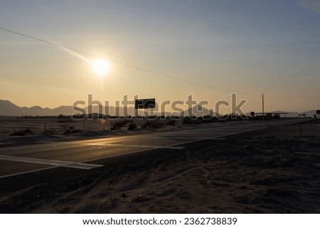 Sunset over the hills, view from the highway. Royalty-Free Stock Photo #2362738839
