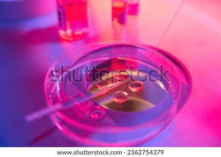 Biotechnological embryo biopsy procedure in a modern laboratory Royalty-Free Stock Photo #2362754379