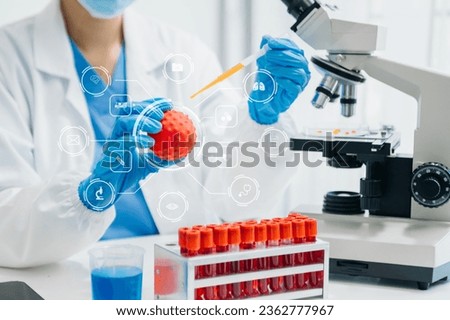 DNA molecule testing concepts. The doctor in a mask examines DNA molecules on the chemical laboratory with virtual icon screen