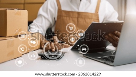 Entrepreneur male working at home about online business. Business owner using calculator and laptop working at home office.