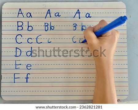 Letter formation and Handwriting practice for preschoolers Royalty-Free Stock Photo #2362821281