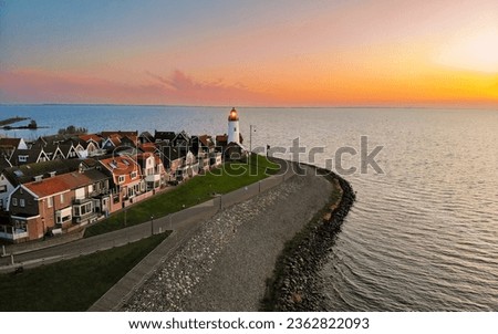 Lighthouse of Urk Netherlands during sunset in the Netherlands at the lake Ijselmeer