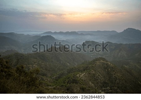 View of the Lunar Landscape of the El Valle natural park, in Murcia, Spain, at dawn with fog