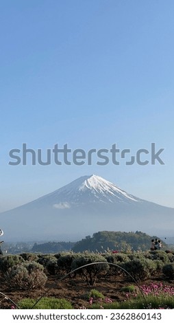 A Family taking picture with Mount Fuji View (RAW Image)