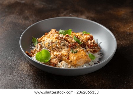 Marry Me Chicken. Creamy Garlic Sun Dried Tomato Chicken with rice. Healthy food Royalty-Free Stock Photo #2362865153