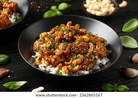 Crispy cashew Chicken stir fry with rice. Asian take away food Royalty-Free Stock Photo #2362865167