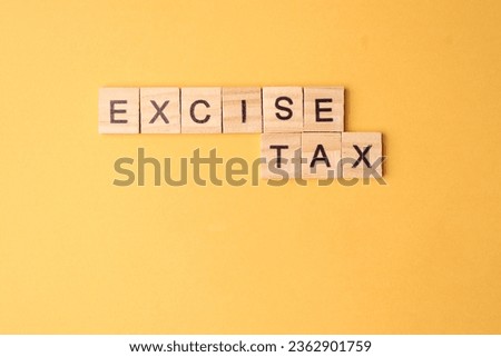 Excise Tax Wooden Blocks Words