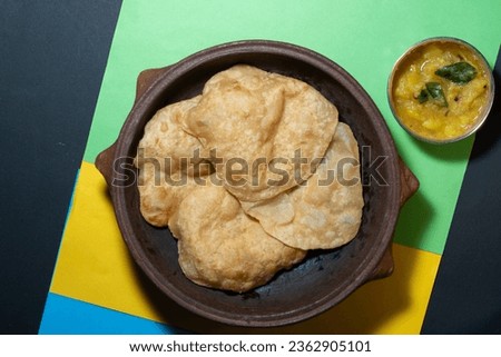 Indian food dining-North indian cuisine-puri masala,or poori bhaji,with potato curry,vegetarian meal,Indian Breakfast, South Indian breakfast named poori masala on a colorful background,green screen