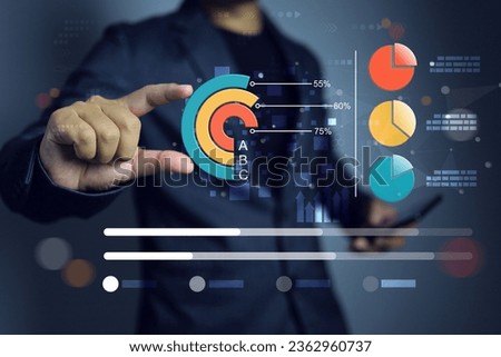 Data visualization chart to record collect data and summarization before investment on business. Businessman touch on donut chart to analyse information to data summary by category segment