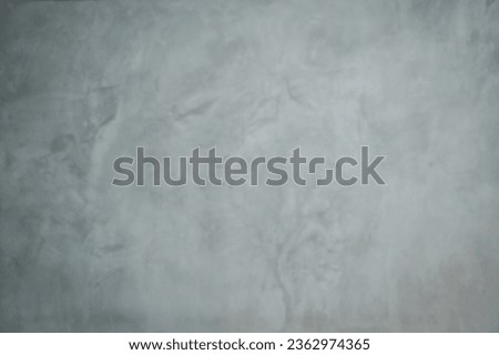 Texture of gray concrete wall with scratches and cracks. Abstract background.
