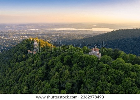 Aerial view of the Sacred Mount of Varese, symbol of the city. This mount is a historic pilgrimage site and Unesco World Heritage for the Sanctuary of Santa Maria del Monte, Varese, Lombardy, Italy