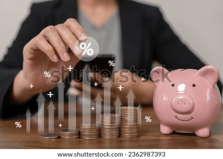 Saving to invest in business Ideas for setting goals for saving Setting a fixed deposit goal with the bank Insurance concept for savings limit. Earned as a percentage from deposits Royalty-Free Stock Photo #2362987393