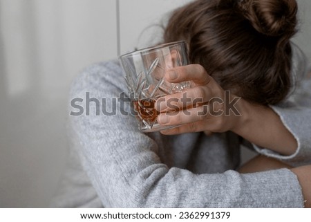 alcoholism, alcohol addiction . drunk woman or female alcoholic drinking whiskey at home. Loneliness and stress. Female alcoholism.  Royalty-Free Stock Photo #2362991379