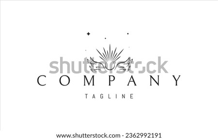 A vector logo with an abstract image of angel wings with a sun in the middle. Royalty-Free Stock Photo #2362992191