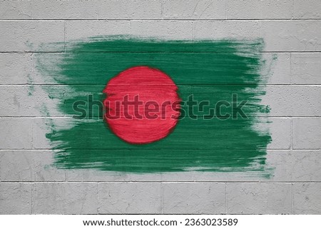 Bangladesh flag colors painted on brick wall