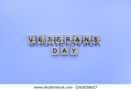 November 11, Veterans day, minimalistic banner with the inscription in wooden letters