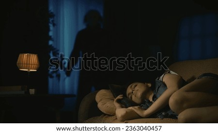 Young girl sleepping on the sofa in the living room, man maniac in white mask standing near the window holding knife.
