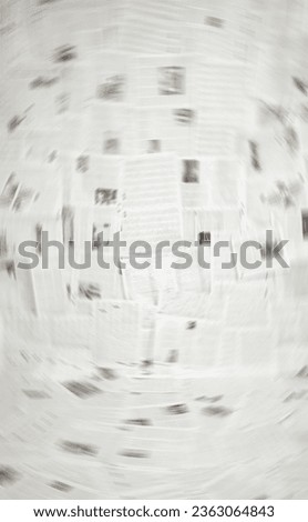 Old newspapers texture. Dynamically blurred background. Not sharp picture as Information dissemination concept. Design element Royalty-Free Stock Photo #2363064843