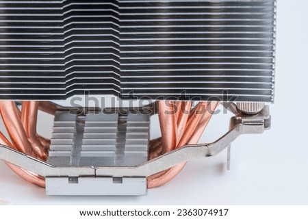 CPU cooling, cooler for cooling the computer processor, radiator with copper tubes for heat removal. Royalty-Free Stock Photo #2363074917