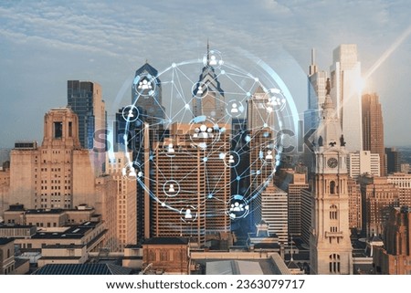 Aerial panoramic cityscape of Philadelphia financial downtown, Pennsylvania, USA. City Hall Clock Tower, sunrise. Social media icons. The concept of networking and establishing people connections