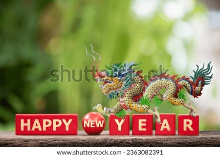 Happy new year 2024 year of the dragon on nature background. Royalty-Free Stock Photo #2363082391