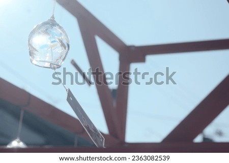 There is cute wind chime on the street Royalty-Free Stock Photo #2363082539