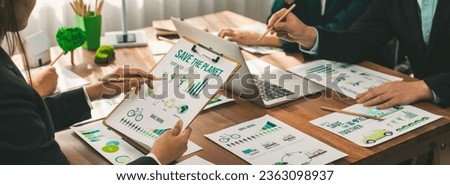 Eco business company meeting with group of business people planning strategy and discuss marketing of eco-friendly and renewable clean energy products. Green business company concept. Trailblazing Royalty-Free Stock Photo #2363098937