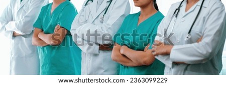 Confident medical staff team with doctor nurse and healthcare specialist professions people in hospital or clinic office. Medical and healthcare community in panoramic banner. Neoteric